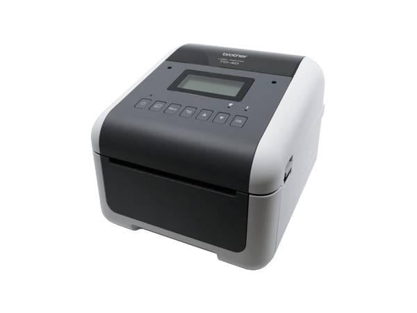 The Brother TD-4550DNWBC is a high-speed direct thermal desktop printer featuring a 300dpi resolution and up to 6 inches per second output. Equipped with broad connectivity including Bluetooth, Wi-Fi, USB, LAN, Serial, and Host USB, it's designed for professional labeling across various media types. This model includes an LCD screen, built-in cutter, and a 2-year premium warranty with SOTI Connect certification for enterprise-level device management.
