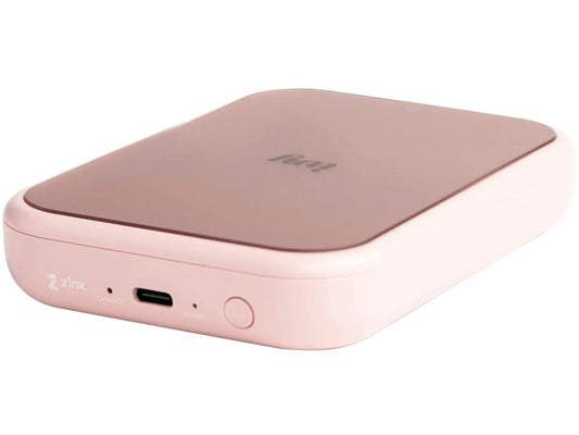 The Canon IVY 2 Mini Photo Printer in Blush Pink is a compact, wireless device designed for effortless mobile photo printing. Utilizing ZINK technology, it delivers smudge-free, tear-resistant prints directly from your smartphone via Bluetooth. Ideal for on-the-go creativity, it supports iOS 9.0+ and Android 6.0+ devices.
