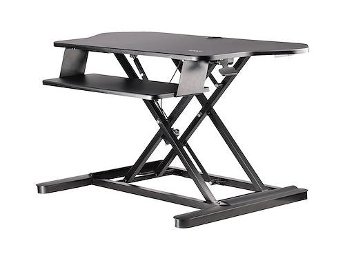 This ergonomic corner sit-stand desk converter from StarTech transforms your workspace into an adjustable standing desk with a 35.7x20in surface area. It requires no assembly, adjusts from 6.1 to 23in in height, and includes a keyboard tray and tools. The sturdy black design supports a range of StarTech monitor arms and is TAA compliant, making it ideal for both government and commercial use.