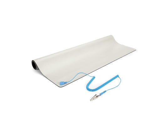 The STARTECH 24x27.5in Beige Desktop Anti-Static Mat is an ideal addition to any electronics workstation, designed to protect both sensitive components and users from electrostatic discharge. This TAA-compliant mat includes a grounding strap with clip, and is constructed using premium static dissipative materials for superior protection and durability. With a generous surface area and rugged PVC/foam construction, it's well-suited for technical assembly, repair, and maintenance environments.